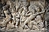 Prambanan - Ramayana reliefs of Shiva Temple. Rama strains Parashurama's bow (scene 8). 